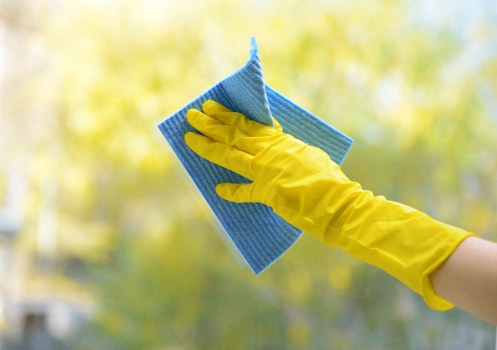 Tenant cleaning a London flat for end of tenancy handover