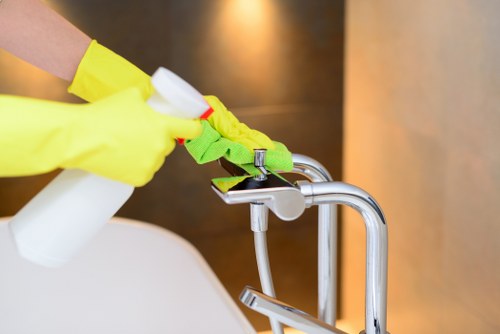 Office cleaning in progress inside a busy London meeting room