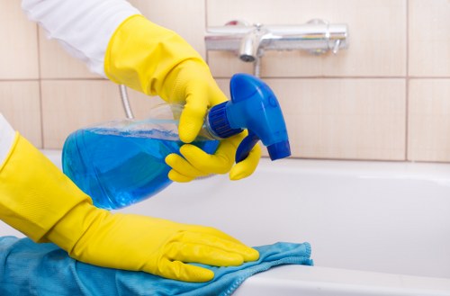Cleaner preparing a London property for a thorough deep clean visit